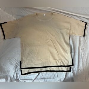 Beige Sweater with Black Trim